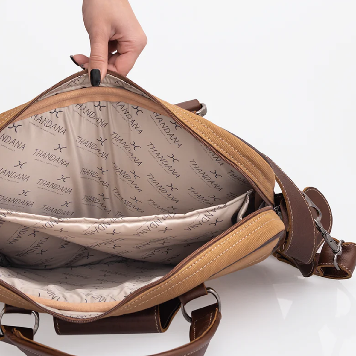 Inside view of the Thandana Laptop Bag featuring padded compartments