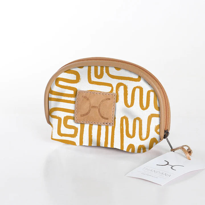 Compact and travel-friendly Thandana Makeup Bag in a stylish patterned design with secure Chunky Zip