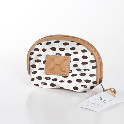 Compact and travel-friendly Thandana Makeup Bag in a stylish patterned design with secure Chunky Zip