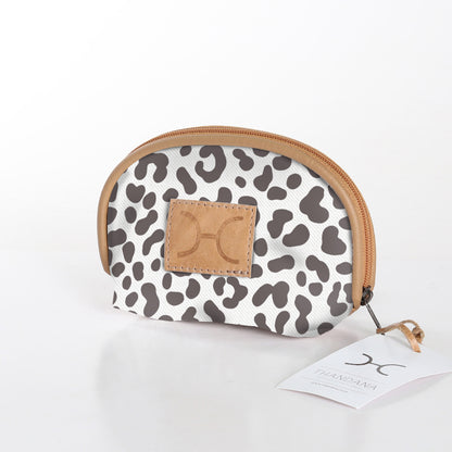 Compact and travel-friendly Thandana Makeup Bag in a stylish patterned design with secure Chunky Zip